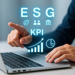 Analyzing ESG KPI data on a laptop, focusing on sustainable business goals. A person points towards the screen