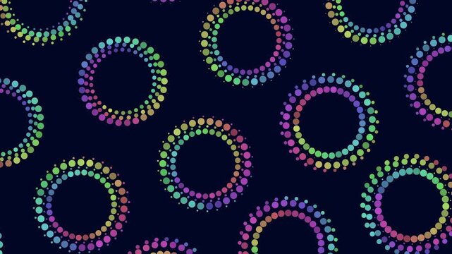 Colorful circles arranged in a symmetrical circular pattern create a seamless design in this image. The circles overlap each other, forming a visually appealing and repetitive pattern