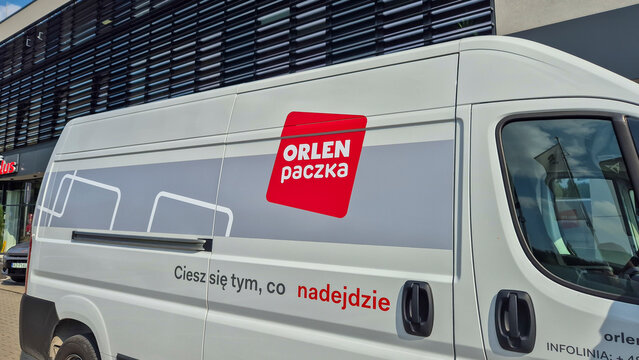 Rzeszow, Poland - September 9, 2025: Close-up of a delivery van featuring the ORLEN paczka logo. The vehicle showcases modern graphics promoting efficient parcel delivery services.