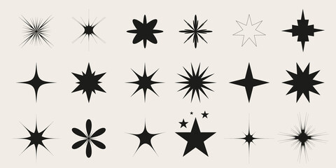 Silhouette star shapes and burst symbols set isolated on light background.