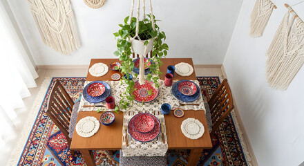 Decorated dining table with plates, rug, and hanging plant representing a cozy lifestyle