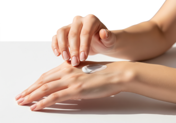 A Person Applying a Rich Moisturizing Cream to Their Hands for Skin Care