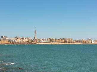 Naklejka premium Cityscape view of Cadiz waterfront from the sea in Andalusia, Spain, September 2025.