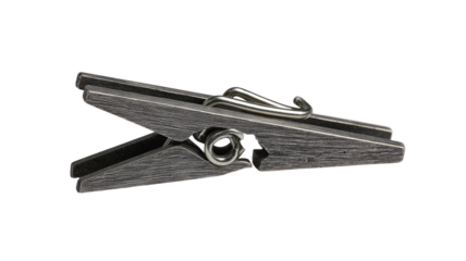 Grey wooden clothespin isolated on black background