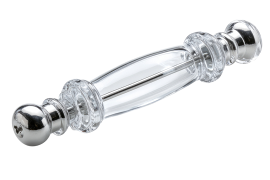Clear acrylic pepper mill with metal accents.  A long, oval-shaped clear acrylic pepper mill, embellished with decorative metal accents.  The mill is topped with rounded metal balls