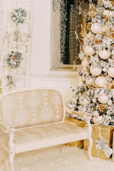 Decorated Christmas tree with golden ornaments and gifts in a festive room interior, on an inviting rug, for holiday season