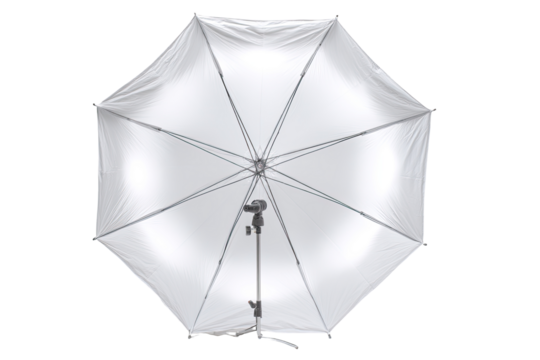 Overhead view of a white, octagonal umbrella-shaped light diffuser.  The umbrella's fabric is smooth and opaque white, and its interior is brightly lit.