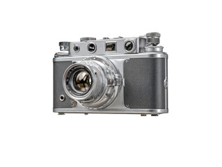 Vintage silver camera, side view.  Shiny metallic body, textured dark gray panel,  large lens