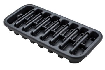 Dark gray plastic ice cube tray on black background, freezer storage