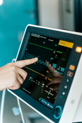Hand Operating Medical Monitor in clinic hospital