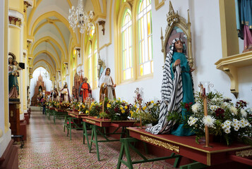 Saints' sculptures inside of the Immaculate Conception Church at the main square of Caramanta...