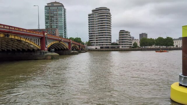 Point of view across River Thames in London, Vauxhall district overcast day England UK