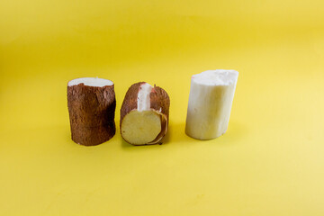 Cassava Roots (Yuca, Manihot esculenta) Cut into Cylindrical Slices, Peeled and Semi-Peeled Tropical Tubers