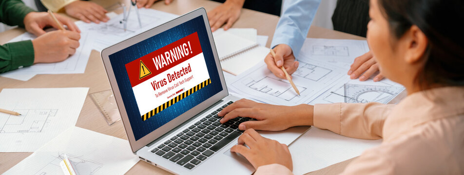 Virus warning alert on computer screen detected brisk cyber threat , hacker, computer virus and malware