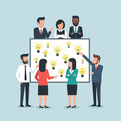 Diverse business team brainstorming ideas on a whiteboard.