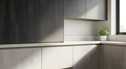 Fototapeta premium Modern Kitchen Design Featuring Wooden Cabinetry With Subtle Sunlight And A Potted Plant