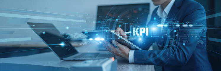 performance tracking Businessman using tab with analysis data of growth to KPI global connection,...