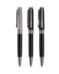 Fototapeta premium Three black and silver pens, in a studio shot