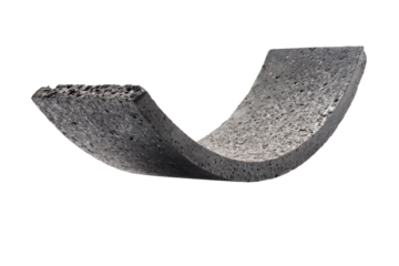 Close-up view of a dark gray, curved, textured material.  The material appears to be a composite or molded substance, possibly rubber or a similar elastomer.  It's sectioned in a U-shape or arc