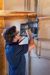 home inspector inspecting a power station