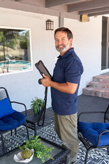 A home inspector inspecting a home, looking at