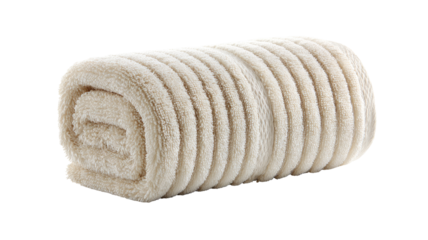 Rolled cream-colored plush blanket