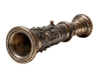 Ornate, bronze-colored miniature cannon.  Detailed carvings adorn the barrel