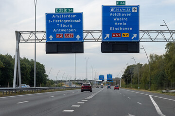 Road transportation in the Netherlands, Dutch highways, road signes, directions, driving car on multi line road, traffic jam in rush hours