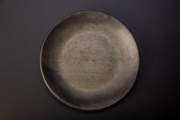 Beautiful plate, beautiful plate alone placed on a dark background, selective focus.