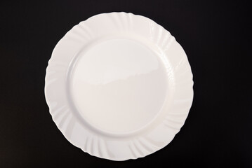 Beautiful plate, beautiful plate alone placed on a dark background, selective focus.