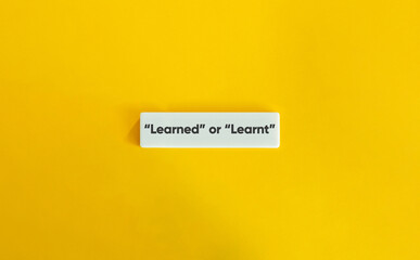 Learned or Learnt Grammar Question on Yellow Background