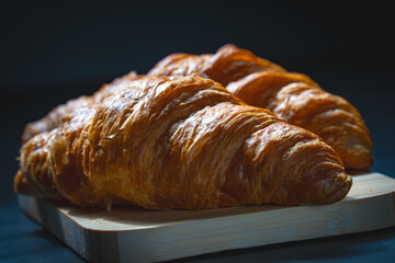 croissant on a wooden table