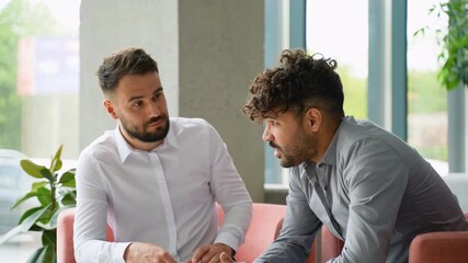 Psychologist listening to Muslim patient problems and taking notes