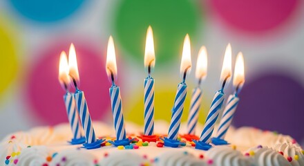 Birthday cake with lit candles and colorful background for celebration event