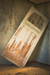 Abandoned door inside a building of Kolmanskop ghost town