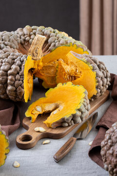 Cut Marina Di Chioggia Squash With Wedges On Table
