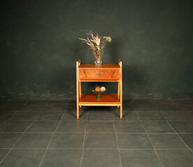 vintage furniture and accessories on a dark background