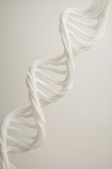 A white DNA strand is shown in a close up