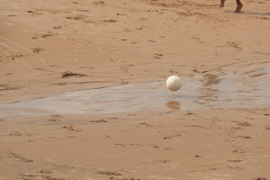 View of a sand soccer ball on Ondina beach. Salvador city, Brazil.