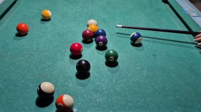 Time to line up the perfect shot on the billiard table.