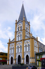 Caramanta, Antioquia, Colombia; March 28, 2024: One side view of the Immaculate Conception Church at the main square of Caramanta.