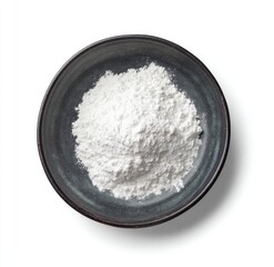 Fine white flour in dark bowl