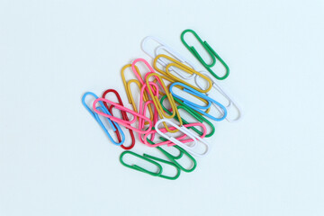 colorful paper clips on a white background
