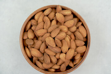 Almonds help lower cholesterol in the body and nourish the heart