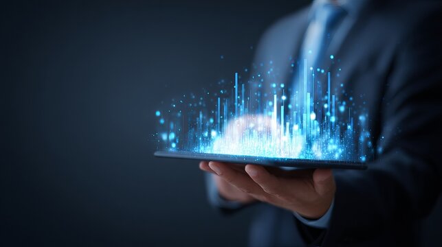 Professional businessman holding tablet displaying glowing digital data streams and futuristic analytics for innovative business growth insights