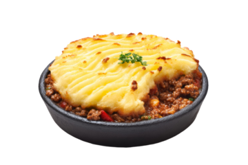 Classic shepherd's pie with golden mashed potato topping in cast iron skillet