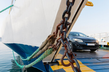 Detail of ferry boat for vehicle transportation.  Off- ramps lower for cars to exit at a ferry...