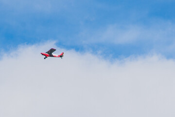 red plane in flight