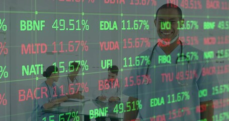 Smiling male in blue scrubs with stethoscope in meeting room, showing ticker overlay, copy space