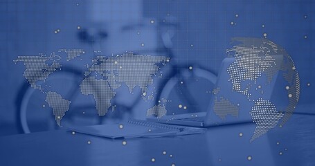 Showcasing silver laptop open on desk in office, with notebook pen glasses bicycle, copy space